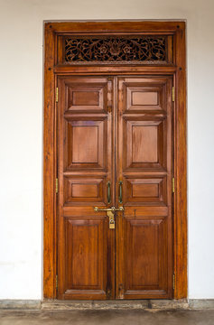Old wooden brown house door