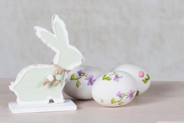 Happy Easter background with bunny rabbit and painted eggs. Easter card