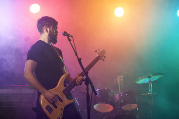 Obraz premium Bass player perform on stage.