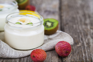Fototapeta na wymiar Yogurt with tropical fruits