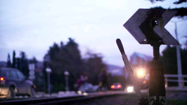 Freight train rides past the camera.