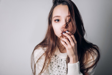 Closeup portrait of a serious brunette woman. Sexy girl