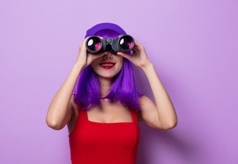 girl with blue hair and binoculars