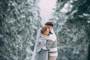 Photo of happy man and woman outdoor in winter