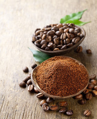 Wooden Bowls with coffee beans and ground coffee