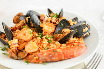 risotto with seafood and tomato, italian food