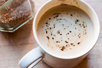 Instant Granulated Coffee Powder with Milk in Cup