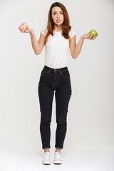 Full length portrait of a frustrated young woman