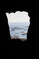 View through a hole in the mountain in Norway, Torghatten