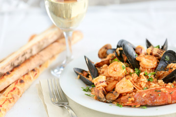 risotto with seafood and tomato, italian food