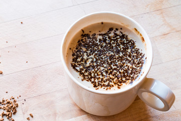 Instant Granulated Coffee Powder with Milk in Cup