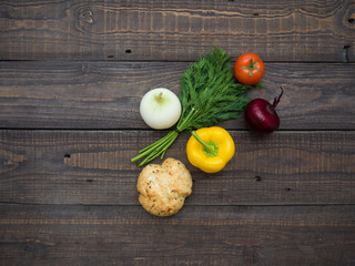 Fresh vegetables and bread on the table
