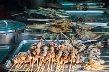 Grilled squids skewers in a market, Siem Rep, Cambodia