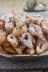 Angel wings biscuits, a traditional European sweet dish for carnival. Rustic style.