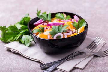 Italian Sicilian orange salad with onion, parsley. Copyspace, horizontal view.
