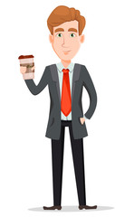 Handsome businessman in suit holding coffee