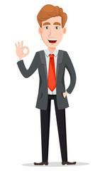 Handsome businessman in suit showing ok sign