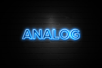 Analog neon Sign on brickwall
