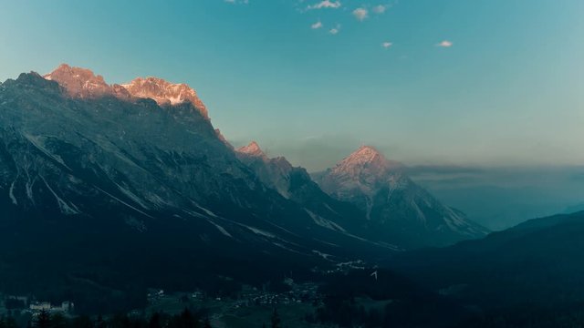 Sunset over mountains timelapse Dolomites Italy Alps