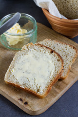 Handmade spelled bread. White background. Salt, flour and butter.