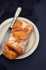 bread with smoked sausage on plate