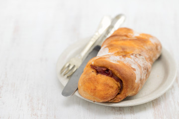 bread with smoked sausage on plate