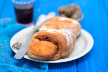 bread with smoked sausage on plate