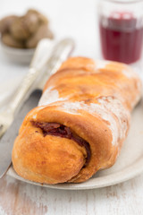 bread with smoked sausage on plate