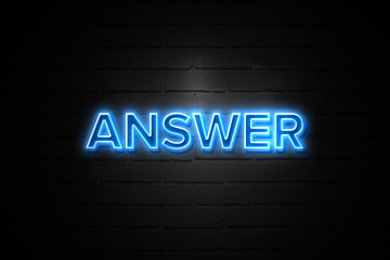 Obraz premium Answer neon Sign on brickwall