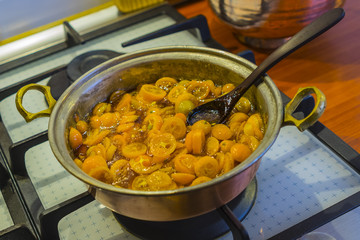 Cooking kumquat homemade jam or marmelade
