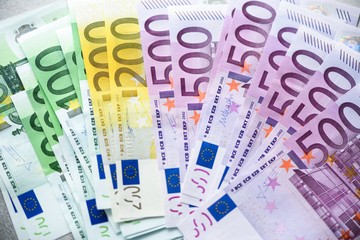 Euro currency money banknotes background. Payment and cash concept. Announced cancellation of five hundred euro banknotes. Top view