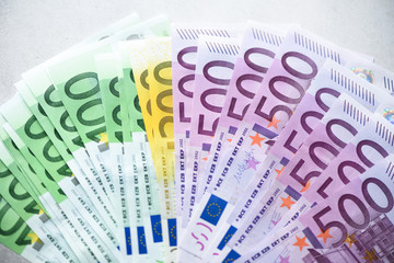 Euro currency money banknotes background. Payment and cash concept. Announced cancellation of five hundred euro banknotes. Top view