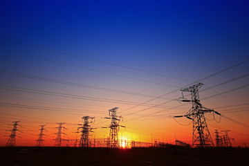 Sunset silhouette of pylon