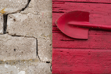Red fire shield on a stone wall