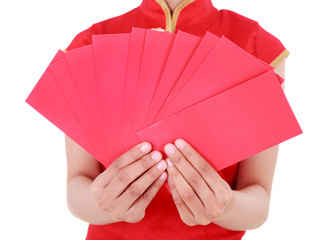 hand holding red envelope in concept of happy chinese new year isolated on white background