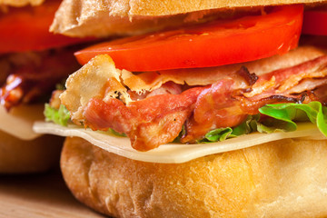 Ciabatta sandwich with smoked bacon, cheese and tomato