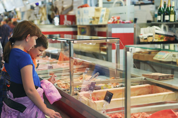 Children choose products in the Sweden fish market, Gothenburg