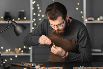 Jeweler working in workshop