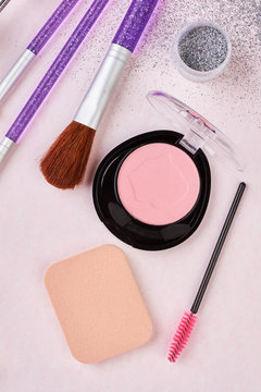 Brushes and blusher for make up. Professional makeup brushes and tools, make-up products kit, flat lay on white background.