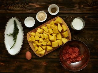 A set of products for cooking salmon cutlets with mashed potatoes.