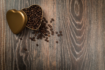 coffe beans on the table heart shaped box