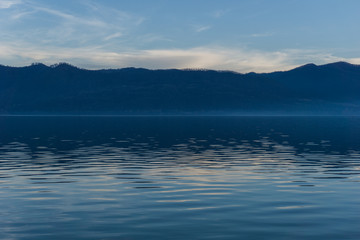 Last evening light reflected in the waters of the Danube river outside the port town of Orsova