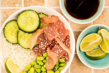 Hawaiian Tuna Fish Poke bowl With Noodles and Edamame Beans