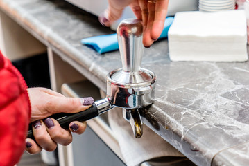 barista making coffee