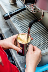 barista making coffee