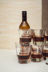 Pyramid of glasses of alcohol made in a pyramid for event party or wedding ceremony