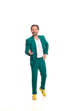 Handsome Man In Green Suit. Isolated On White Background.