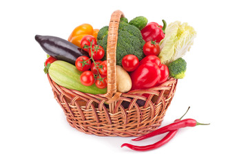 fresh and ripe vegetables arranged in a basket