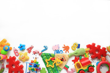 Children's toys and accessorieson a White background.view from above