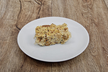 Millet with sour cabbage on a wooden table
